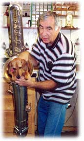 layne Layne Francis, Buescher bass saxophone, daschund, sax repair shop