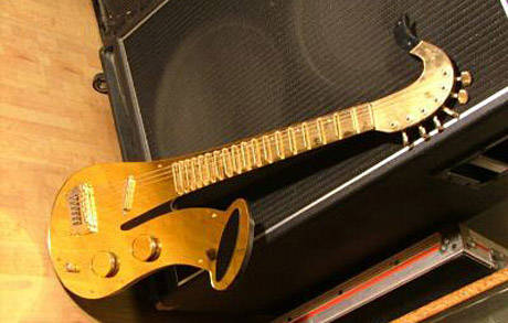 A Sax-Shaped Guitar: Do You Know Anyone Who Would Play This?