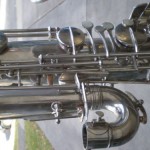 Martelle bass saxophone, socket area front view