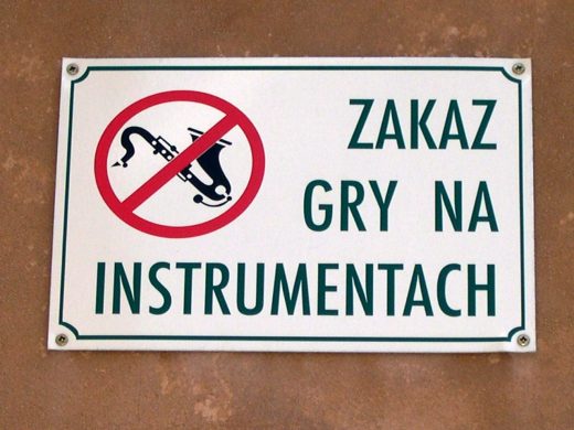 saxophone imagery, no sax, no musical instrument playing, Polish sign,