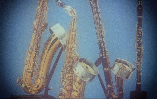 product information card, Valgon Ring, woodwind accessory, 2004, saxophones clarinets and flutes with these rings on them on display, product photography