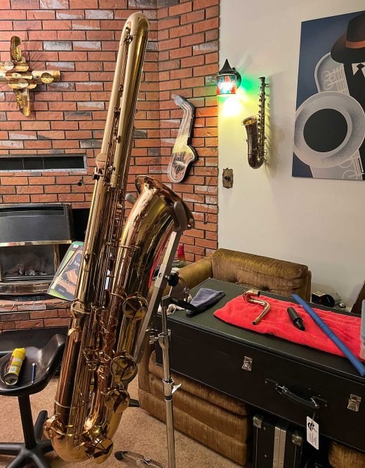 bass saxophone in stand, Couf Superba I bass saxophone, saxophone air drying after being used