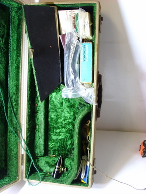 interior of original case with original mouthpiece   ligature