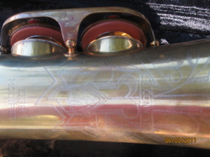 bell engraving with naked lady   rolled tone holes on bell keys