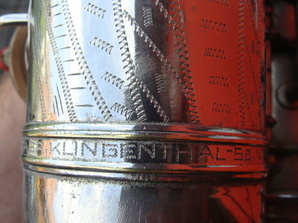engraving on the bell to bow connecting ring 2