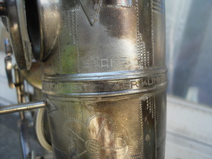engraving on bell to bow connecting ring