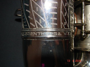 engraving on bell to bow connecting band