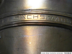 engraving in tne bell to bow connecting ring