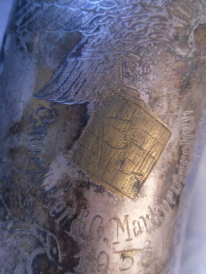 bell engraving altered presumably to remove or hide swastika